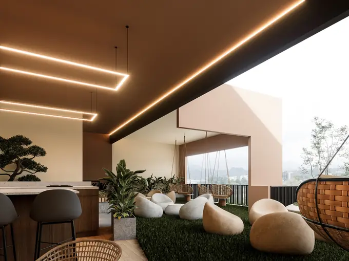 Lounge exterior con asientos orgánicos y vegetación