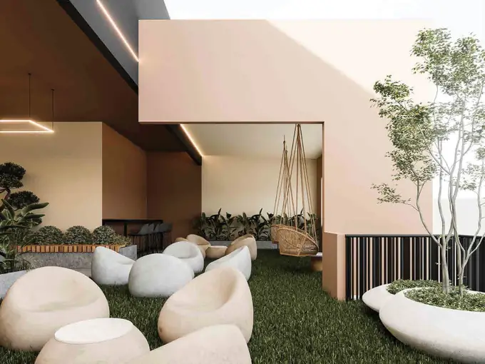 Lounge exterior con sillas colgantes y asientos orgánicos
